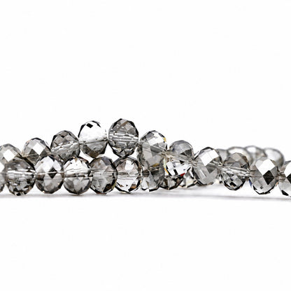 K9 faceted crystal glass rondelle beads in Transparent Gray - sold by the strand