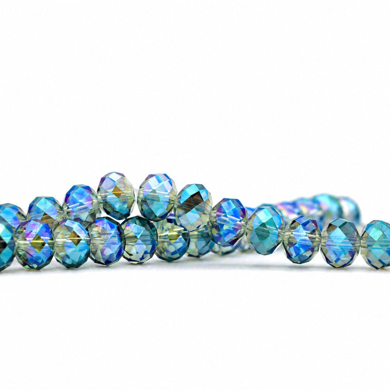 K9 faceted crystal glass rondelle beads in Transparent Green - sold by the strand