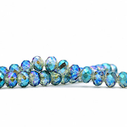 K9 faceted crystal glass rondelle beads in Transparent Green - sold by the strand