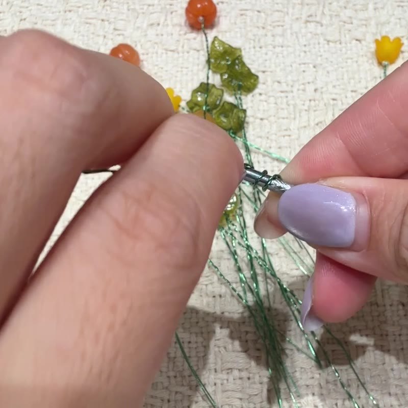 Wire winding around a thin round rod.