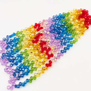 Rainbow faceted glass bead strands in red, yellow, green, blue, and purple